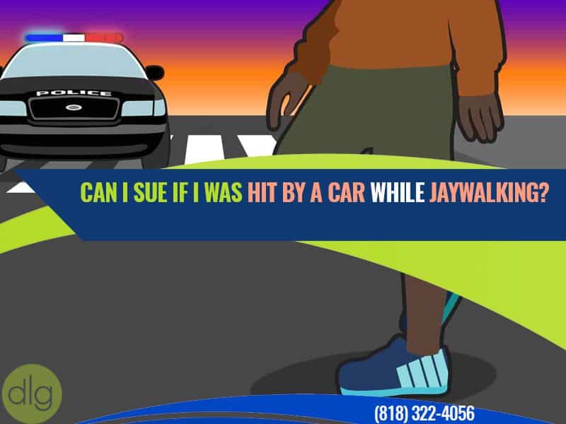 A person stands at a crosswalk with a police car nearby; text reads, "Can I sue if I was hit by a car while jaywalking?" and includes a phone number.