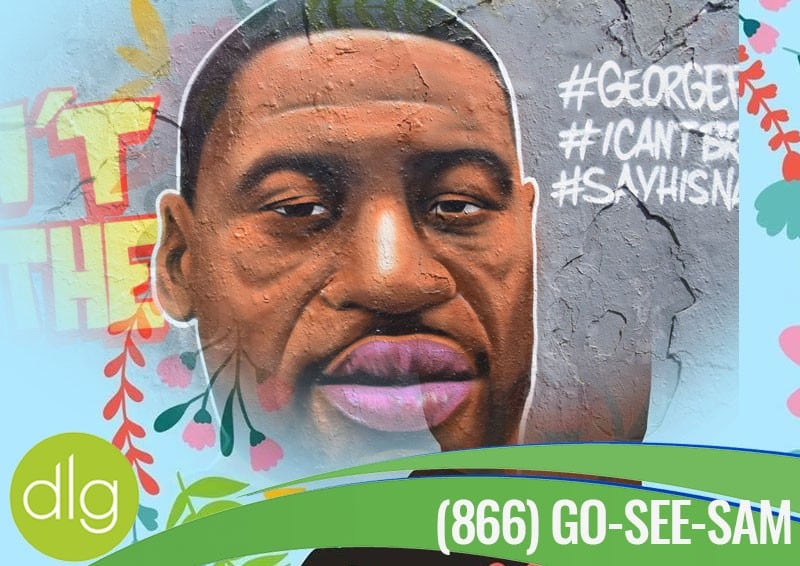 Mural of George Floyd with hashtags #GeorgeFloyd, #ICANTBREATHE, and #SAYHISNAME painted on a wall; dlg logo and phone number (866) GO-SEE-SAM at the bottom.