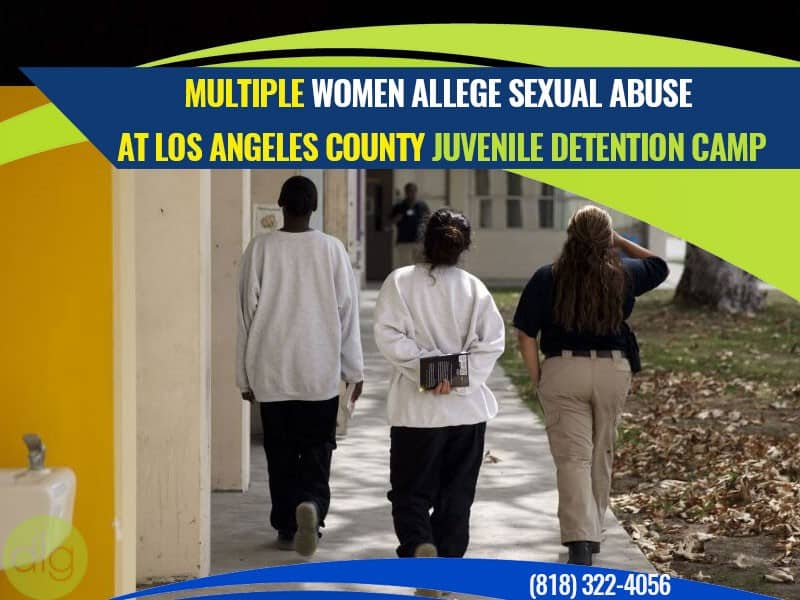 Three people, two in casual clothing and one in uniform, walk together outside a building. Text overlays report sexual abuse allegations at a Los Angeles County juvenile detention camp.
