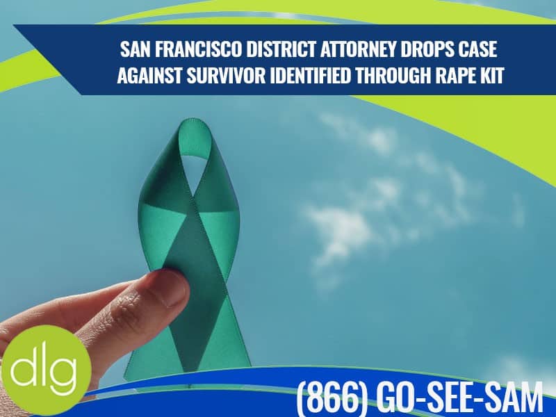 A hand holds a teal awareness ribbon against the sky; text above discusses a San Francisco DA dropping a case involving a survivor identified by a rape kit.