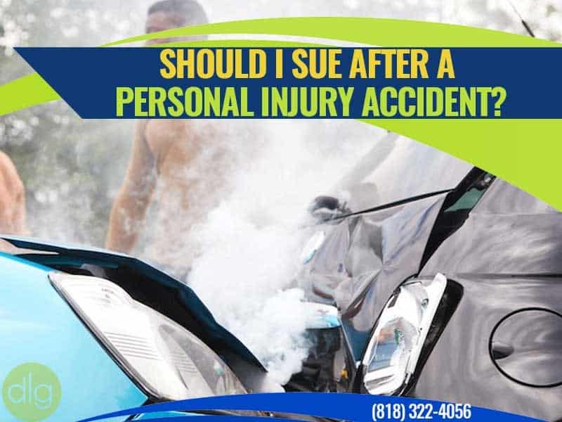 Two cars involved in a front-end collision with smoke rising; text reads "Should I sue after a personal injury accident?" and a phone number is displayed.