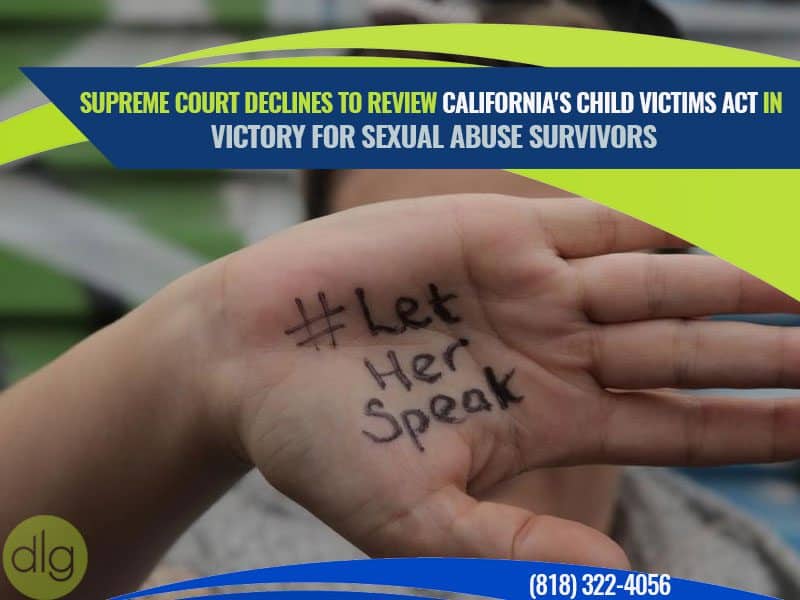 A hand with "Let Her Speak" written on the palm is held up, with a headline about the Supreme Court declining to review California's Child Victims Act in the background.