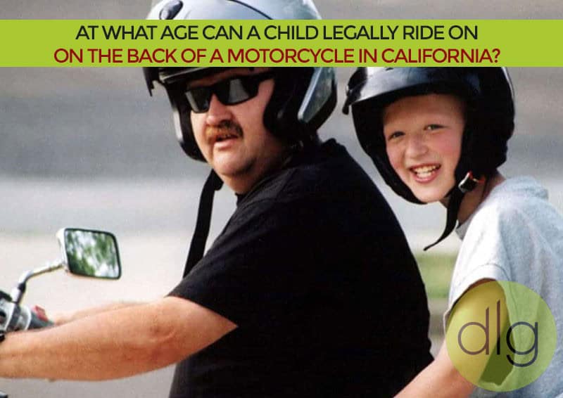 An adult and a child wearing helmets ride together on a motorcycle; a green banner above asks about legal child passenger age in California.