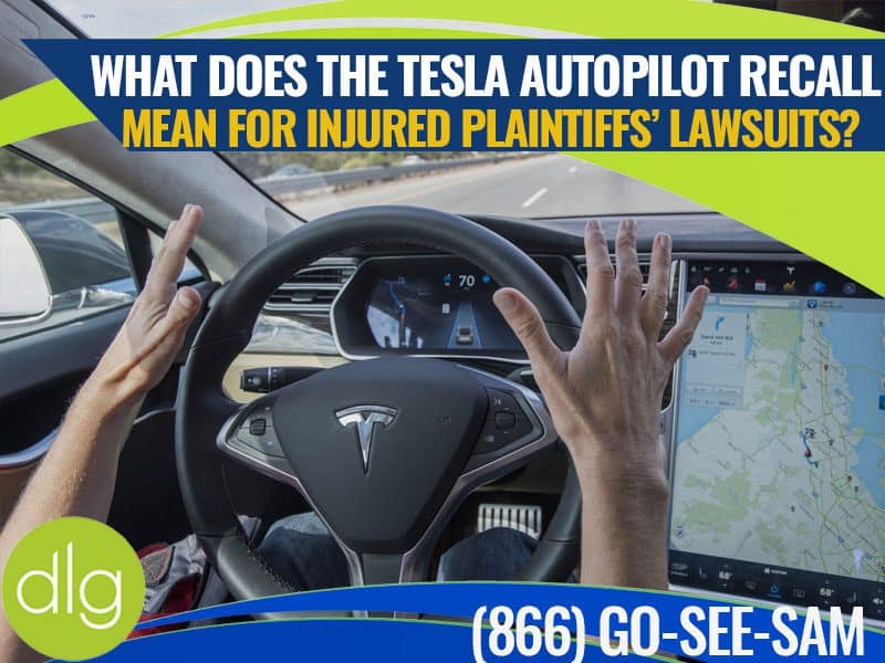 A person sits in the driver's seat of a Tesla with hands off the wheel, dashboard showing, with text about Tesla Autopilot recall and plaintiff lawsuits.