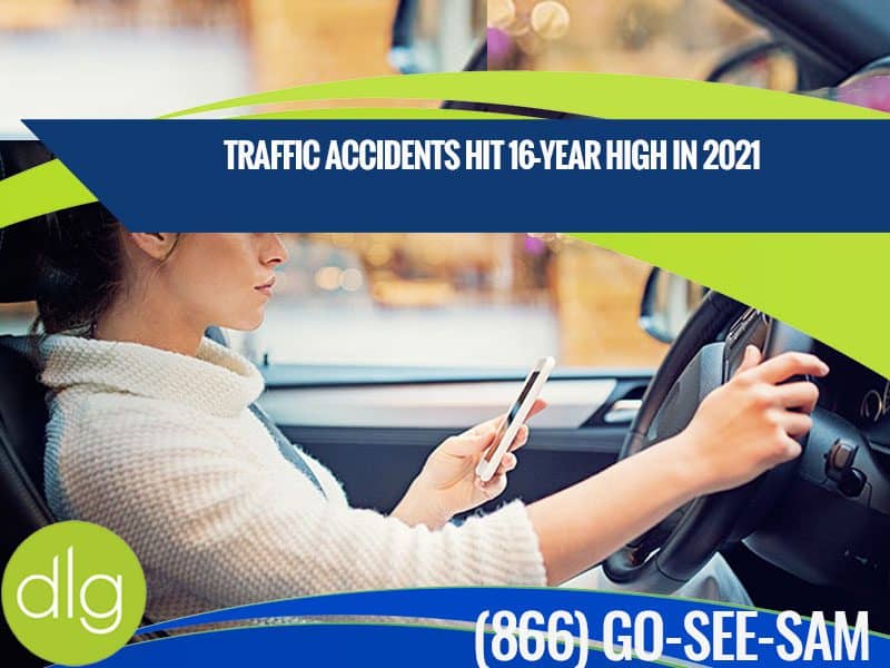 A woman sitting in a car holding a phone, with a headline stating, "Traffic accidents hit 16-year high in 2021," and contact info displayed at the bottom.