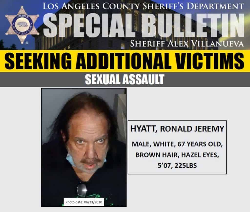 A police bulletin seeking additional sexual assault victims features a mugshot and details of a suspect identified as Ronald Jeremy, age 67, with physical description and photo date.